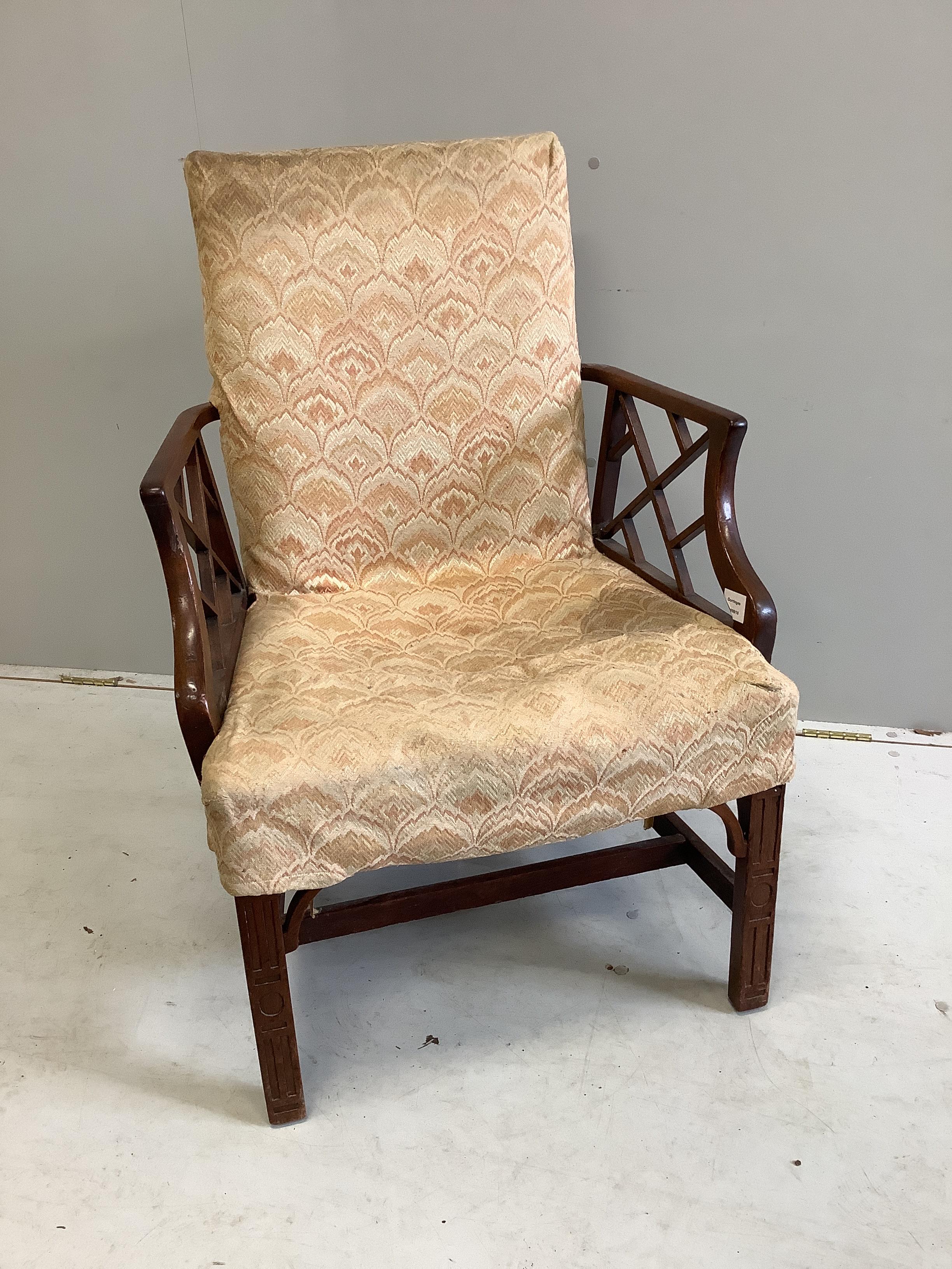 A George III Chinese Chippendale style mahogany elbow chair, width 65cm, depth 50cm, height 93cm